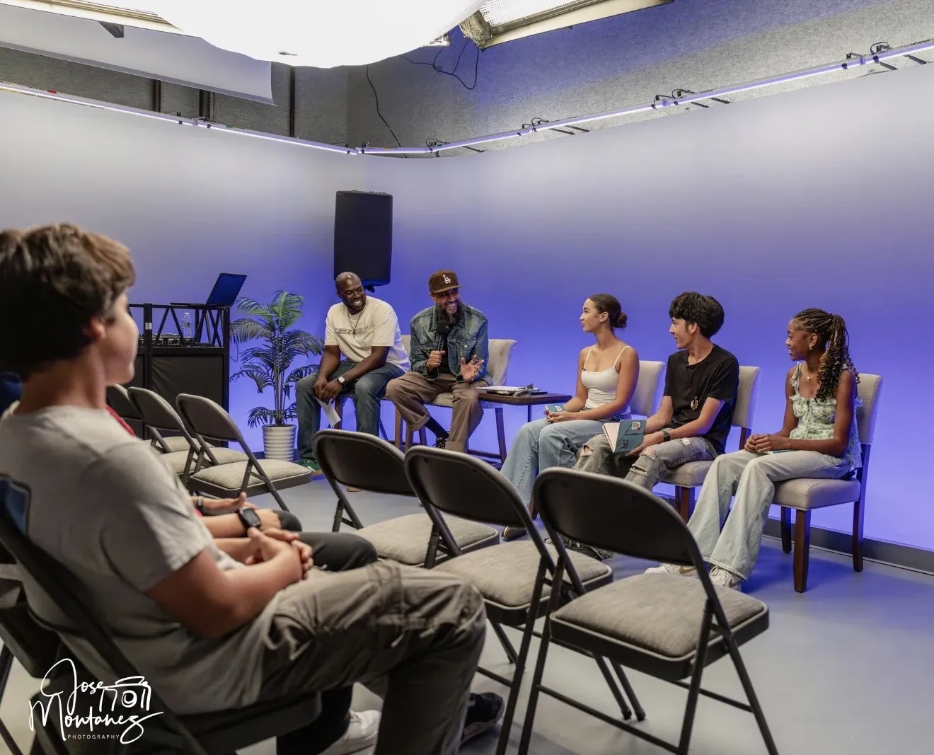 High school students leading a panel for other teens on the KGEM Television set